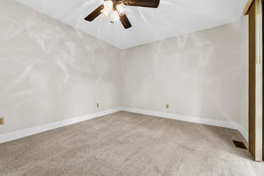 352 Della Dr, Saint Peters, MO 63376 - carpeted empty room with ceiling fan and baseboards