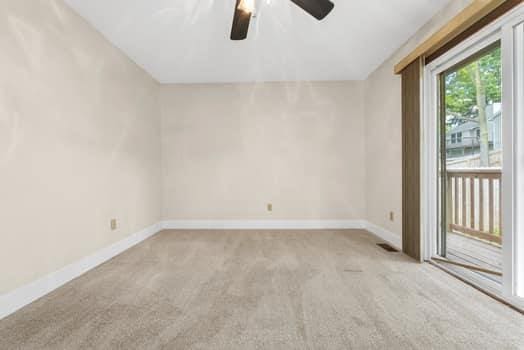 352 Della Dr, Saint Peters, MO 63376 - spare room featuring ceiling fan, carpet floors, and baseboards