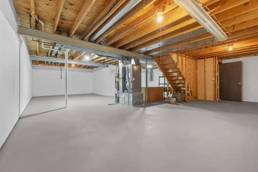 352 Della Dr, Saint Peters, MO 63376 - unfinished basement with stairs and heating unit