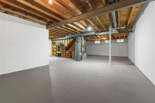 352 Della Dr, Saint Peters, MO 63376 - basement featuring stairway and water heater
