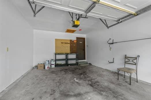 352 Della Dr, Saint Peters, MO 63376 - garage with a garage door opener