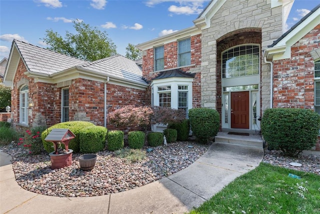 4516 Austin Point Ct, Saint Charles, MO 63304 - view of exterior entry with brick siding and stone siding