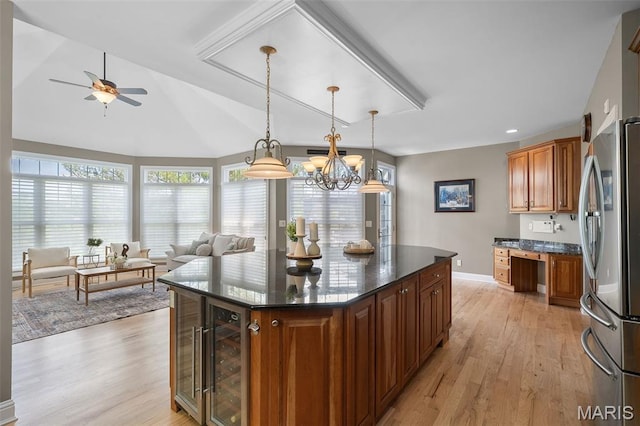 4516 Austin Point Ct, Saint Charles, MO 63304 - kitchen featuring freestanding refrigerator, beverage cooler, light wood-style flooring, ceiling fan, and vaulted ceiling