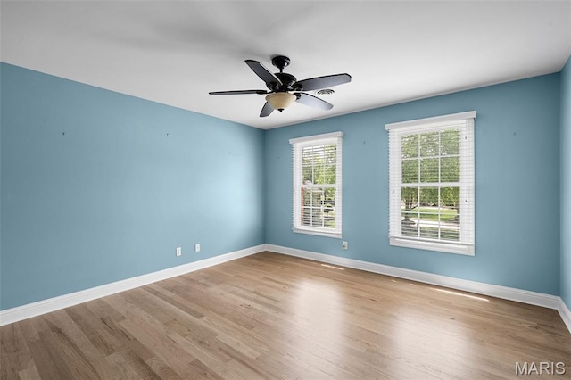 4516 Austin Point Ct, Saint Charles, MO 63304 - unfurnished room with wood finished floors and a ceiling fan
