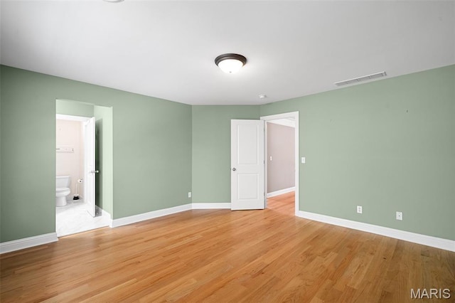 4516 Austin Point Ct, Saint Charles, MO 63304 - empty room featuring baseboards and light wood-type flooring