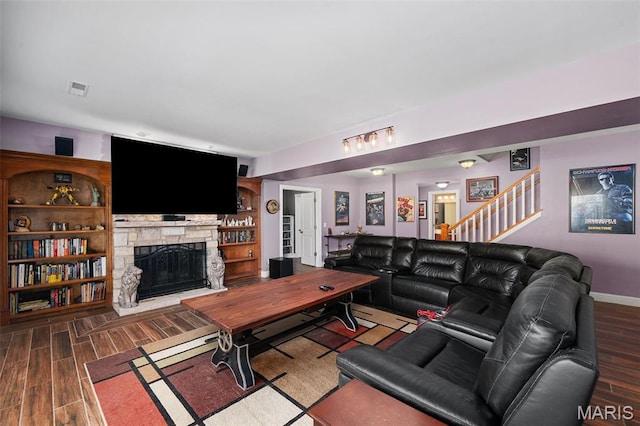 4516 Austin Point Ct, Saint Charles, MO 63304 - living area with wood finished floors, a stone fireplace, and stairway