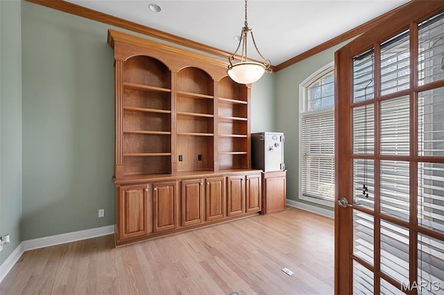 4516 Austin Point Ct, Saint Charles, MO 63304 - unfurnished dining area featuring ornamental molding and light wood-style flooring