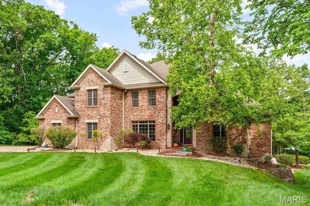4516 Levis Ln, Godfrey, IL 62035 - view of front facade featuring a front lawn and brick siding