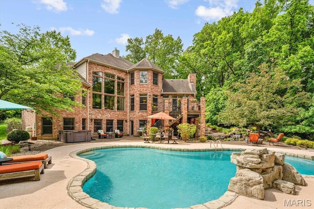 4516 Levis Ln, Godfrey, IL 62035 - outdoor pool with a patio