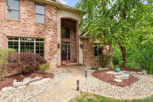 4516 Levis Ln, Godfrey, IL 62035 - view of exterior entry featuring brick siding