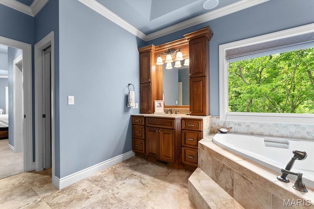 4516 Levis Ln, Godfrey, IL 62035 - full bath featuring vanity, a bath, crown molding, connected bathroom, and baseboards