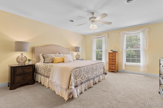 4516 Levis Ln, Godfrey, IL 62035 - bedroom with carpet floors, baseboards, and a ceiling fan