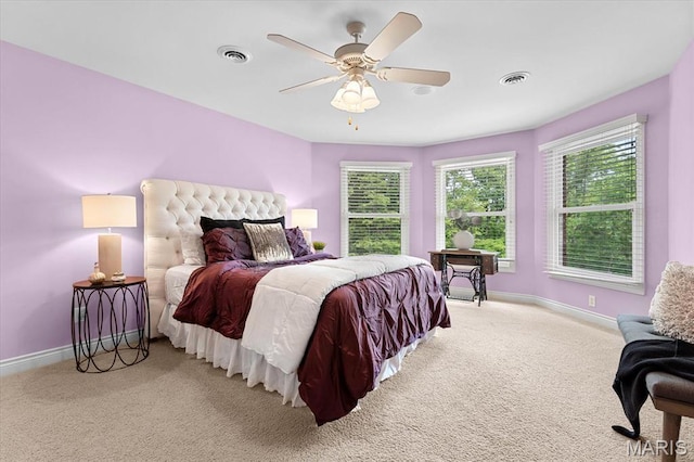 4516 Levis Ln, Godfrey, IL 62035 - carpeted bedroom featuring baseboards and ceiling fan