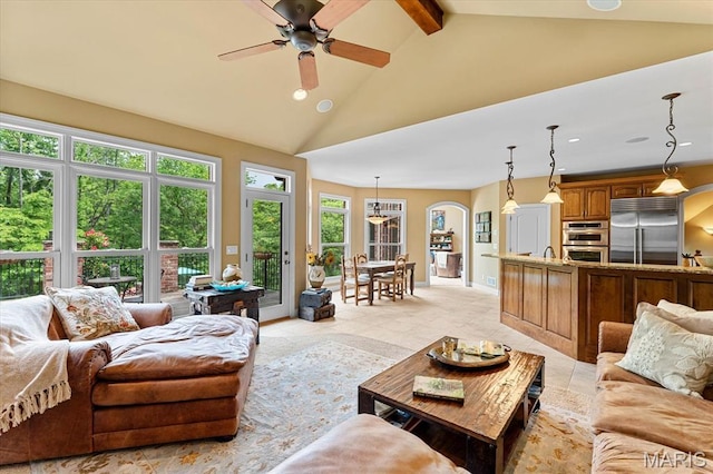 4516 Levis Ln, Godfrey, IL 62035 - living area with recessed lighting, a ceiling fan, high vaulted ceiling, and beam ceiling