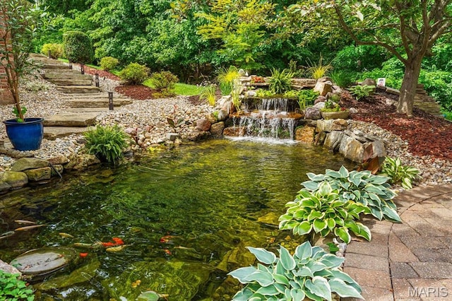 4516 Levis Ln, Godfrey, IL 62035 - view of yard with a garden pond