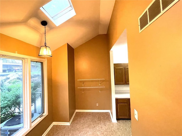 13613 Mason Oaks Ln Unit 3, Saint Louis, MO 63131 - interior space featuring a skylight and vaulted ceiling