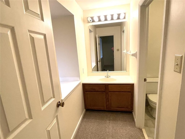 13613 Mason Oaks Ln Unit 3, Saint Louis, MO 63131 - bathroom featuring vanity and toilet