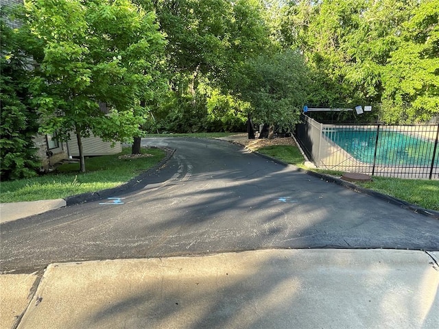 13613 Mason Oaks Ln Unit 3, Saint Louis, MO 63131 - view of road featuring curbs