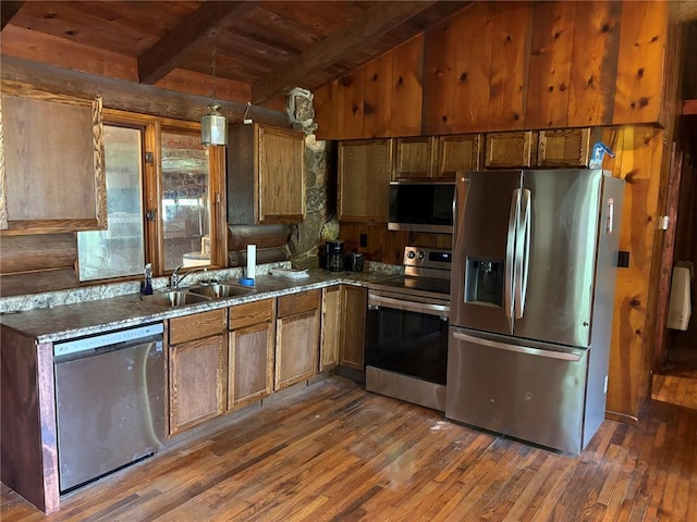 232 Ripley Unit A-1, Doniphan, MO 63935 - kitchen with appliances with stainless steel finishes, a sink, wooden ceiling, dark wood-style flooring, and hanging light fixtures