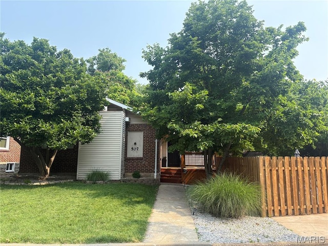 507 Alphonse Dr, Kirkwood, MO 63122 - view of property hidden behind natural elements featuring brick siding