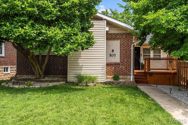 507 Alphonse Dr, Kirkwood, MO 63122 - view of front facade with brick siding and a front yard