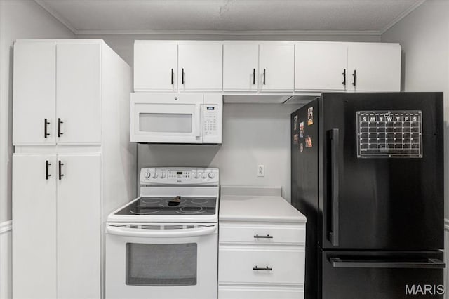 507 Alphonse Dr, Kirkwood, MO 63122 - kitchen featuring white appliances, light countertops, crown molding, and white cabinetry