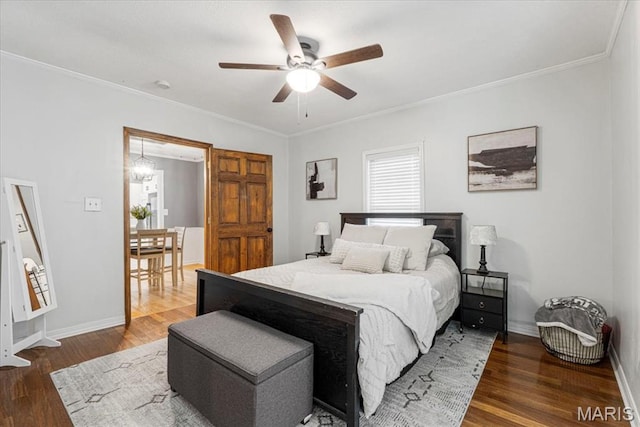 507 Alphonse Dr, Kirkwood, MO 63122 - bedroom featuring wood finished floors, ornamental molding, baseboards, ceiling fan, and a chandelier