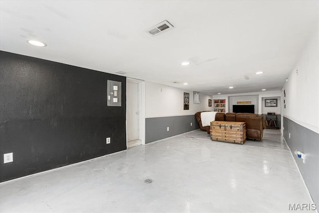507 Alphonse Dr, Kirkwood, MO 63122 - unfurnished living room featuring finished concrete flooring and recessed lighting