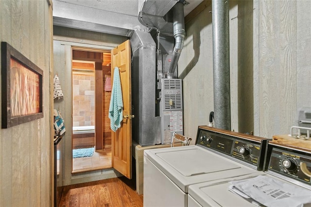 11 Glen Hollow Rd, Glen Carbon, IL 62034 - laundry room with washing machine and dryer and wood finished floors