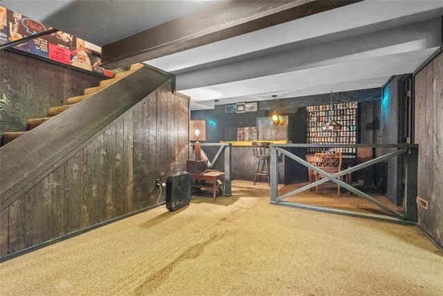 11 Glen Hollow Rd, Glen Carbon, IL 62034 - stairway featuring carpet floors, a dry bar, wooden walls, and beam ceiling