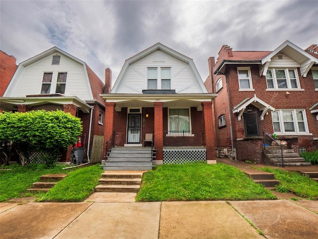 2614 Minnesota, Saint Louis, MO 63118 - dutch colonial with a gambrel roof, covered porch, and brick siding