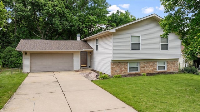 243 Mill Run Ln, Saint Peters, MO 63376 - split level home with an attached garage, brick siding, and driveway