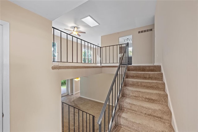 243 Mill Run Ln, Saint Peters, MO 63376 - staircase with carpet floors, baseboards, healthy amount of natural light, and ceiling fan