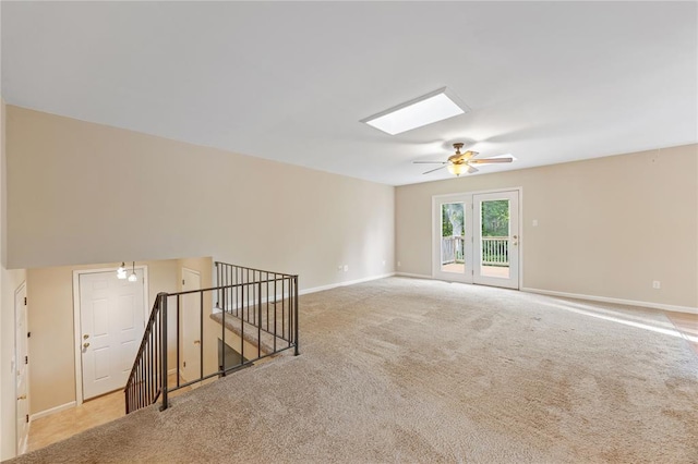 243 Mill Run Ln, Saint Peters, MO 63376 - carpeted empty room featuring baseboards, a skylight, and a ceiling fan
