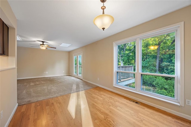243 Mill Run Ln, Saint Peters, MO 63376 - spare room featuring light wood-type flooring, baseboards, and a ceiling fan