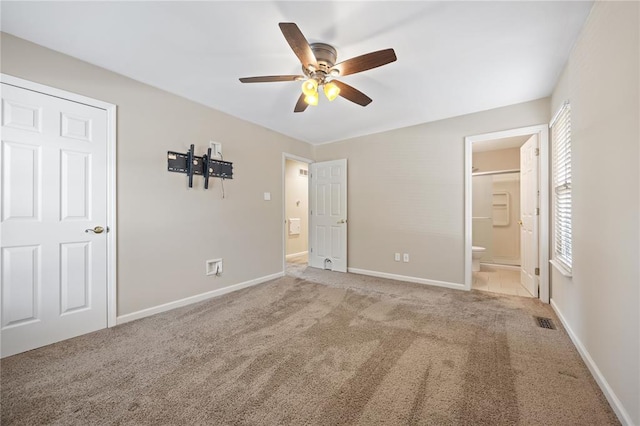 243 Mill Run Ln, Saint Peters, MO 63376 - unfurnished bedroom featuring carpet floors, baseboards, connected bathroom, and ceiling fan