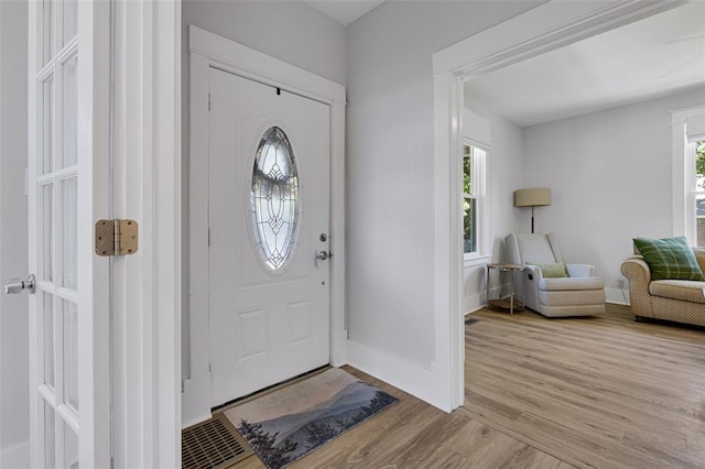 120 W Thornton Ave, Webster Groves, MO 63119 - foyer featuring wood finished floors and baseboards