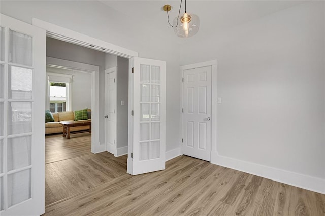 120 W Thornton Ave, Webster Groves, MO 63119 - dining space featuring light wood-style floors, baseboards, and french doors