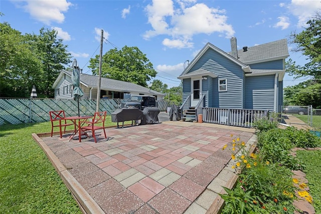 120 W Thornton Ave, Webster Groves, MO 63119 - back of house featuring a patio, a chimney, and entry steps