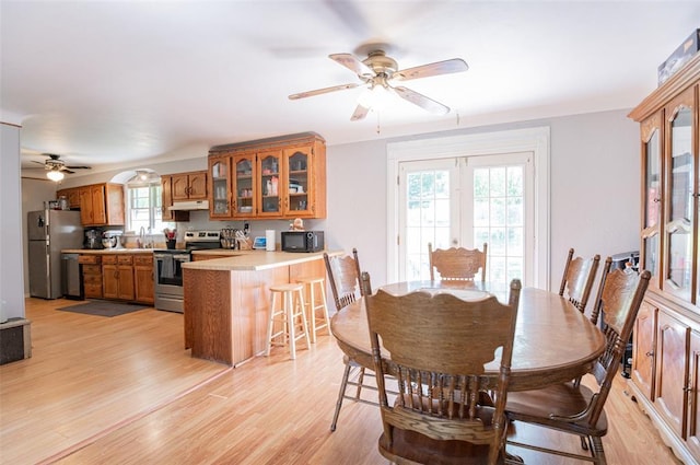 300 N Alvarado Ave, Belle, MO 65013 - dining room with ceiling fan and light wood-type flooring