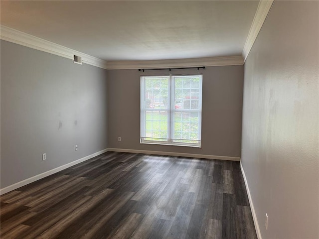 635 Rosetta Dr Unit D, Florissant, MO 63031 - spare room featuring ornamental molding, dark wood-type flooring, and baseboards