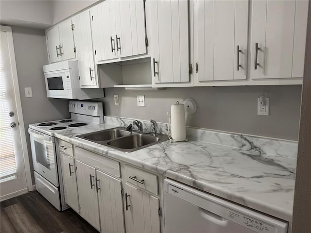 635 Rosetta Dr Unit D, Florissant, MO 63031 - kitchen featuring white appliances, a sink, light countertops, dark wood-type flooring, and white cabinets