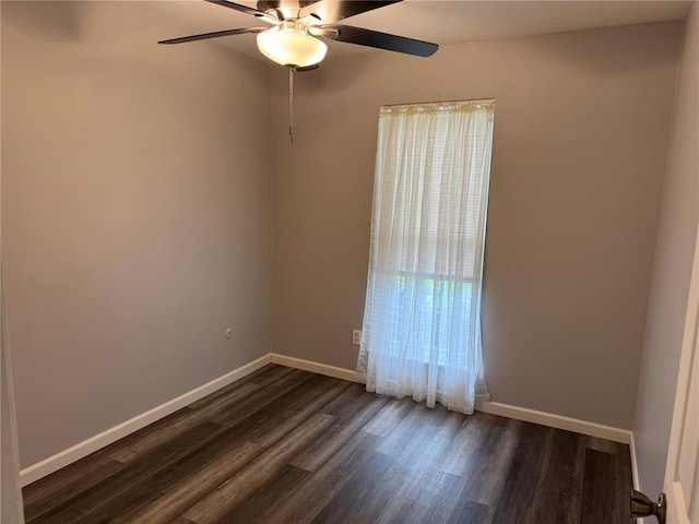 635 Rosetta Dr Unit D, Florissant, MO 63031 - empty room with a ceiling fan, dark wood-style floors, and baseboards