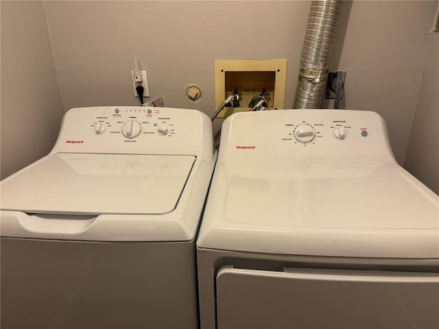 635 Rosetta Dr Unit D, Florissant, MO 63031 - washroom with washing machine and dryer