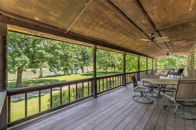 765 Carter 103, Van Buren, MO 63965 - deck with ceiling fan, outdoor dining area, and a yard