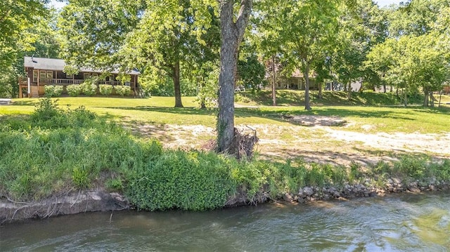 765 Carter 103, Van Buren, MO 63965 - view of grassy yard with a deck with water view