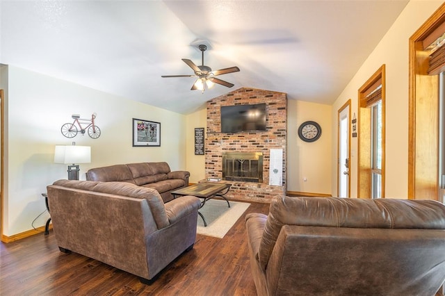 765 Carter 103, Van Buren, MO 63965 - living room featuring dark wood-style flooring, vaulted ceiling, ceiling fan, a fireplace, and baseboards