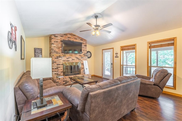 765 Carter 103, Van Buren, MO 63965 - living room featuring dark wood finished floors, ceiling fan, a fireplace, baseboards, and lofted ceiling