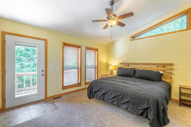 765 Carter 103, Van Buren, MO 63965 - bedroom featuring access to exterior, vaulted ceiling, ceiling fan, baseboards, and carpet flooring