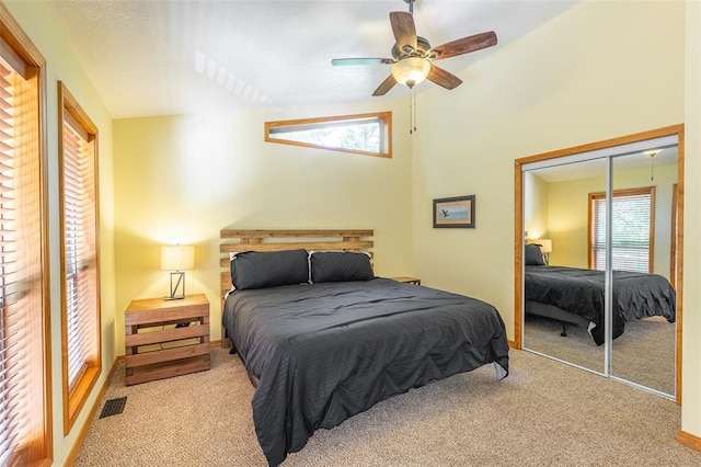 765 Carter 103, Van Buren, MO 63965 - carpeted bedroom featuring a closet, multiple windows, a ceiling fan, and baseboards